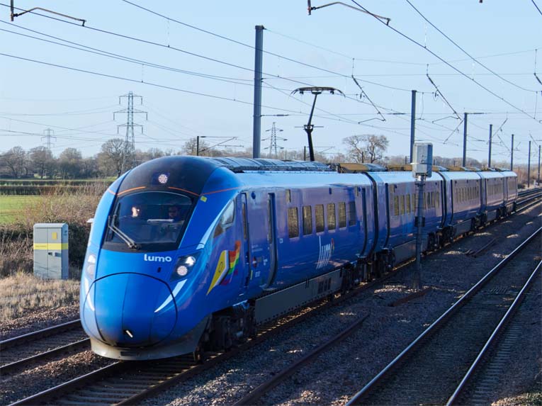 Lumo on the ECML up fast at the Hun Road foot bridge on the 26th January 2024