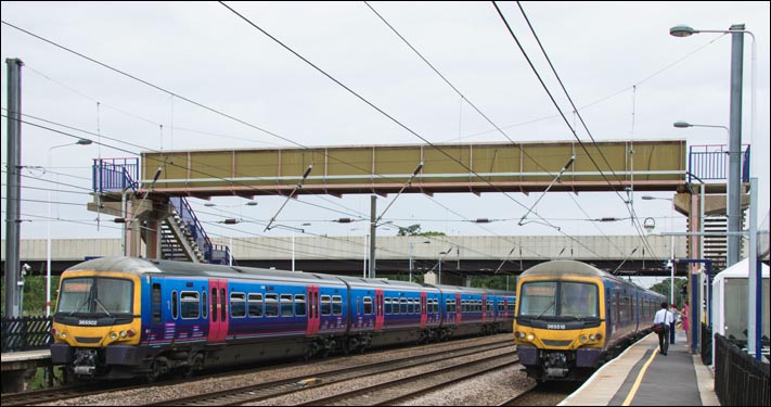 Arlesey railway station 5th August 2014 with First Capital Connect 365502 and  Class 365518 