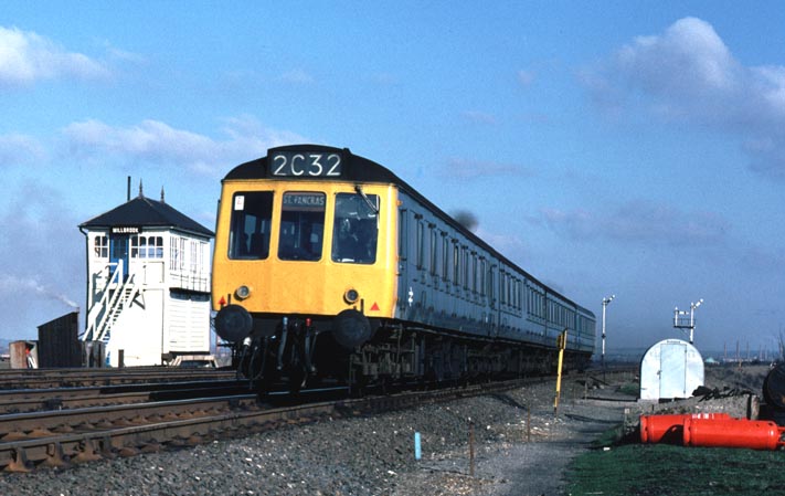 DMU from Bedford to St Pancras station in London near to Millbrook signal box 