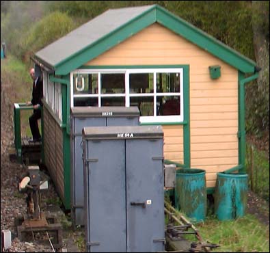 Small cabin built over a ground frame at the south end of Kingscote station 