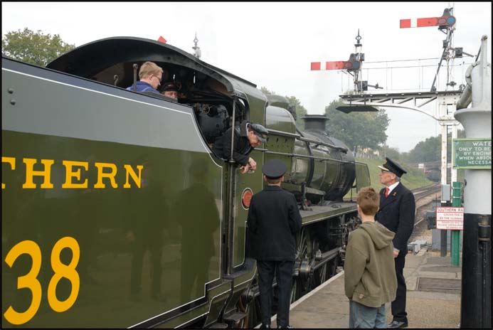 Southern Railway U class 2-6-0 number 1638 waits in Horsted Keynes station 