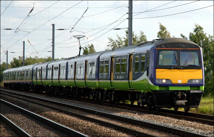 Class 321405P on the down slow at Conington 