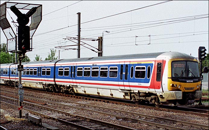 West Anglia Great Northern class 317348 comes into Hitchin station on train to London Kings cross station in 2004