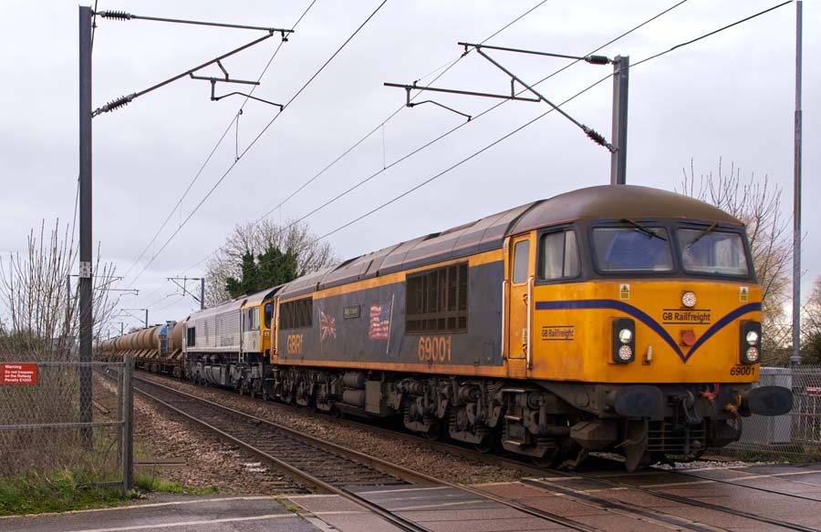 GBRf class 69001 and 66793 on Wednesday 3rd of January in 2024 at Holme level crossing