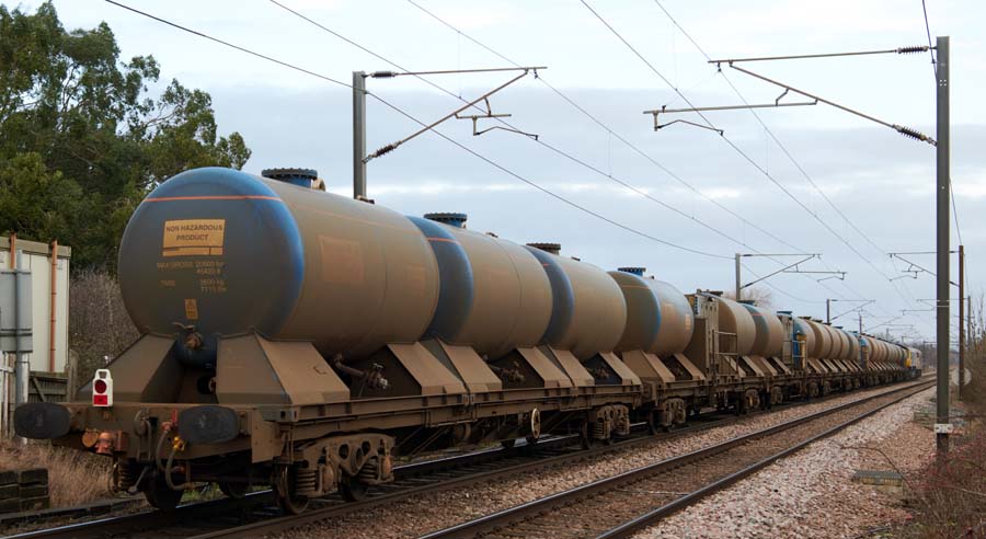 Dirty Railhead Treatment  tank wagons now covered in the brown treament dust head for Peteborough