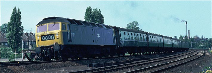 Class 47 just to the north of Kettering station on a train of Mark ones
