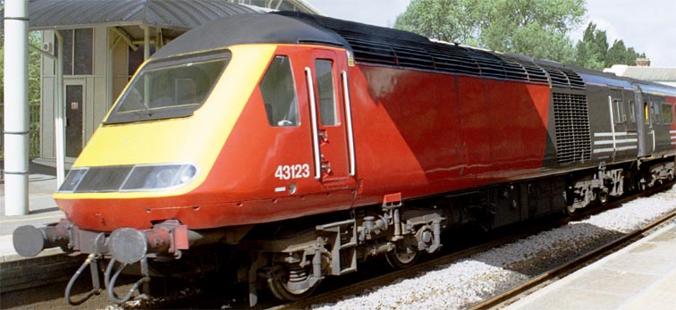 This HST power car on down Midland Mainline train is still in Virgin West Coast red 