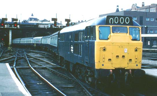 A class 31 in BR blue comes into Kings Cross with a train of blue and grey Mark ones  class 31 in BR blue comes into Kings Cross
