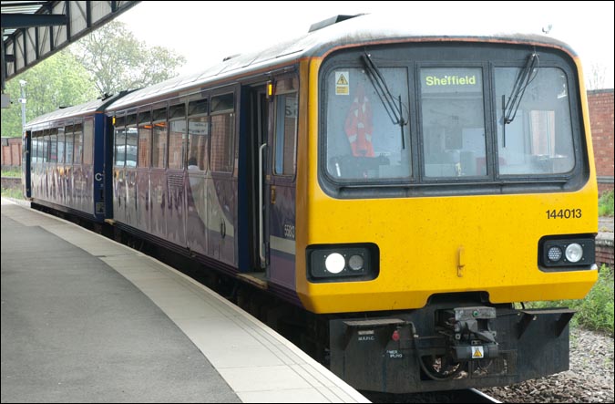 Lincoln station on 24th May in 2012 with 144013 in platform 5 with a train to Sheffield