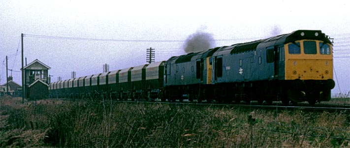 A pair of class 25s near Horsemear signal box.