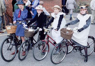 Four young ladys with there cycles