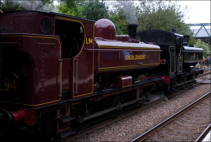 GWR class 57XX pannier tanks one in London transport colours as L49 and GWR 0-6-0ST 9600 in BR lined black at Melton Mowbray Station in 2012