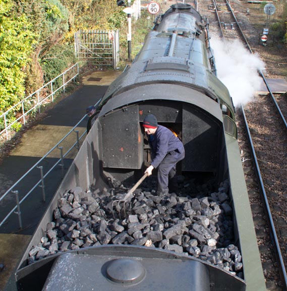 Coal being racked towards the footplate of SR Rebuilt Merchant Navy Class 4-6-2 no 35018 