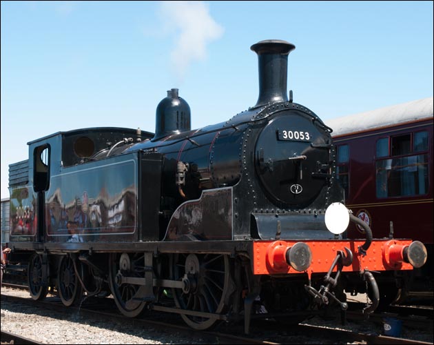 Drummond 0-4-4T Class M7 steam locomotive no.30053 at Dereham station on the 19th of July 2013