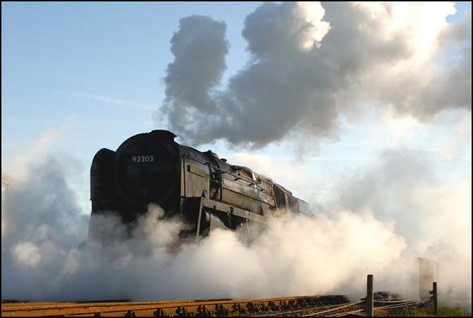 9F 2-10-0 92203 coming off shed  on the North Norfolk Railway 