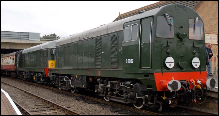 Two class 20s with D8007 Orton Mere station 