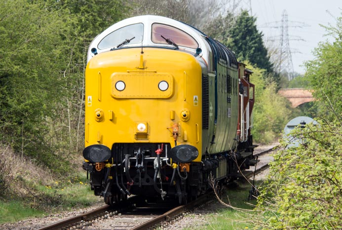 Class 55018 on the brake van rides along the Fletton Branch 