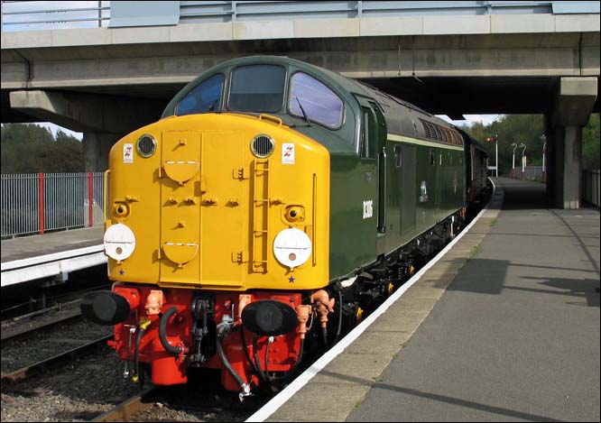 D 306 comes under the Park-way road bridge at Orton Mere in 2004