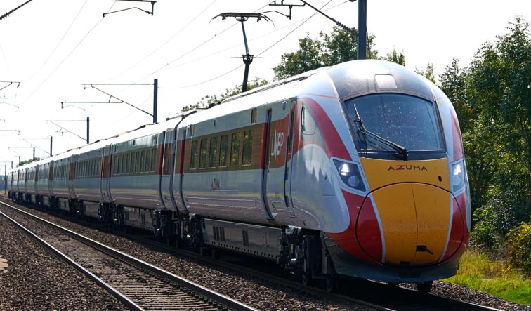 LNER Azuma at the Church Lane crossing with an down train