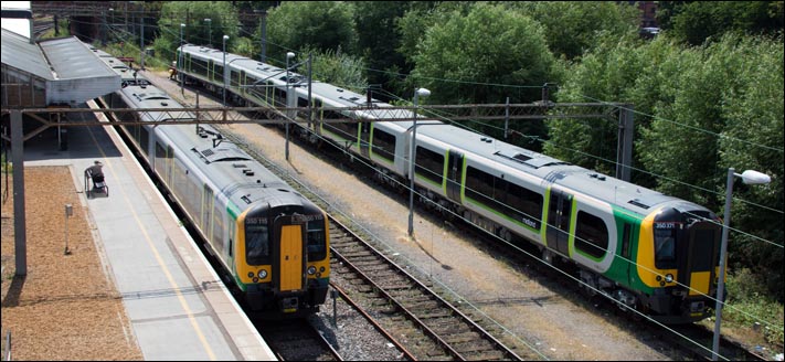 London Midland Class 150 015 in Northamton station and London Midland 150 371 