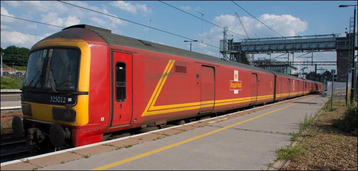 Class 325012 Royal Mail EMU heading north at Northamton station on 24th of July 2014