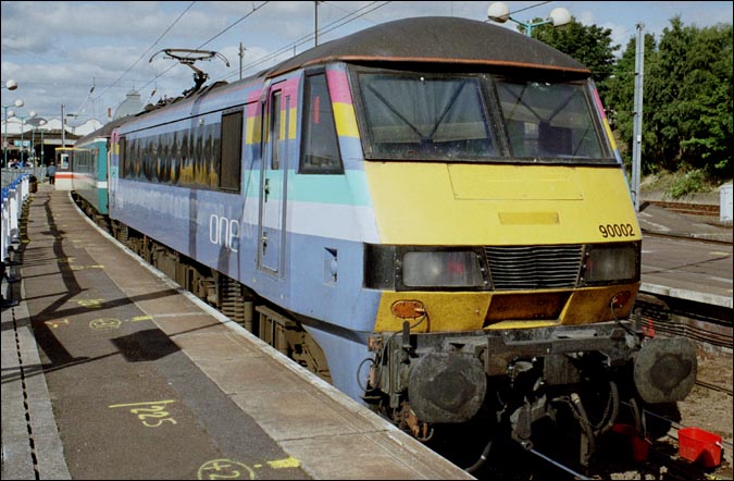90002 in the then new "ONE" colours with a train to London from Norwich in 2005
