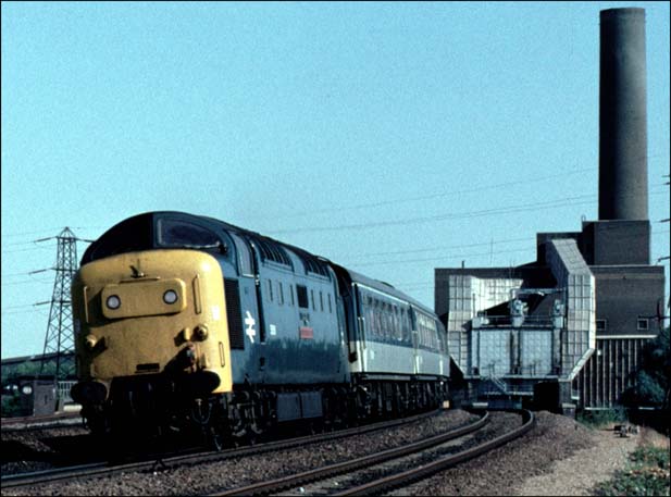  Class 55 Deltic on the up fast line with old Peterborough power station in the back ground