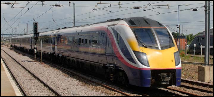 Class 180 Adelante 50911 on the down fast at Peterborough 