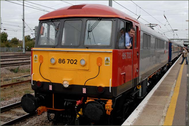 class 86 702 in platform 2 at Peterborough in 2009  class 86 702 in platform 2 at Peterborough in 2009