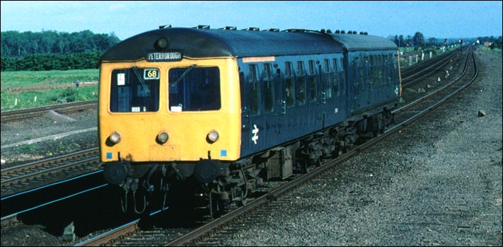 A DMU on the down slow at Walton on a train from Spalding.
