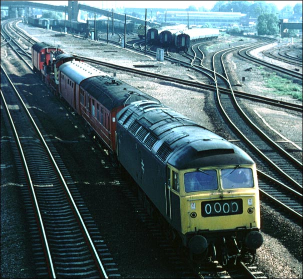 A class 47 with the breakdown train on the down fast