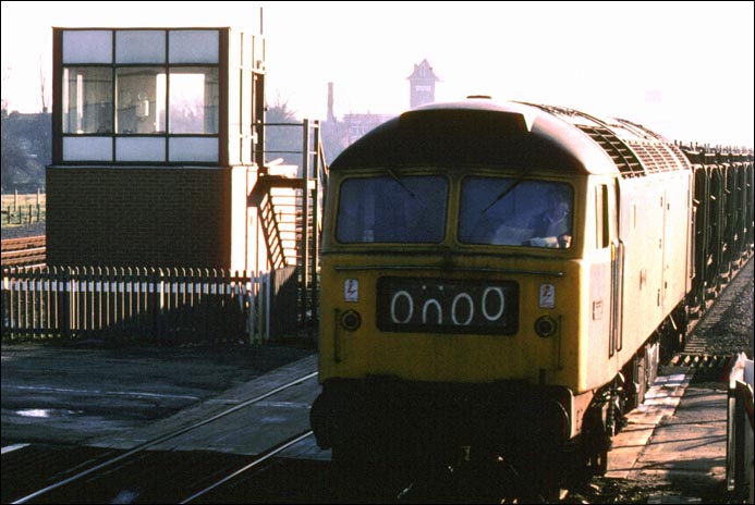 class 47 on a fly-ash Train on the Stamford line at the site of Walton Crossing