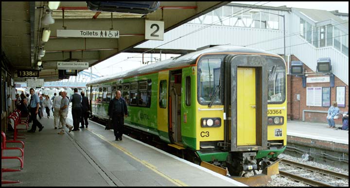 Platform 2 at Peterborough with Central 153364 in 2005 