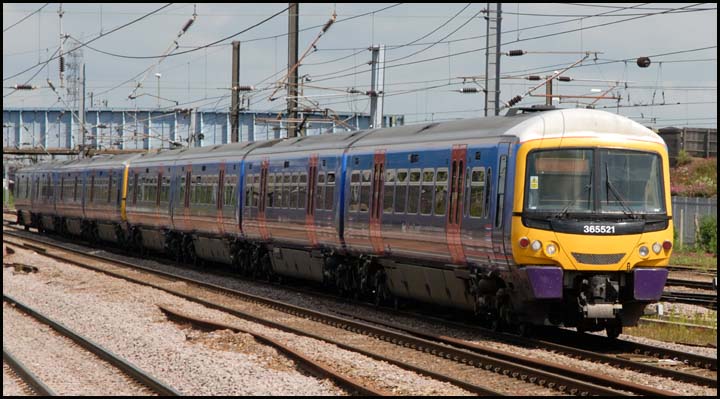 First Capital Connect (FCC) 365521 on the up fast at Peterborough 