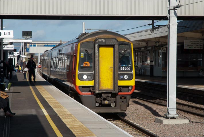 East Midland trains class 158799 in platform 6 at Peterborough on the 21st February 2014