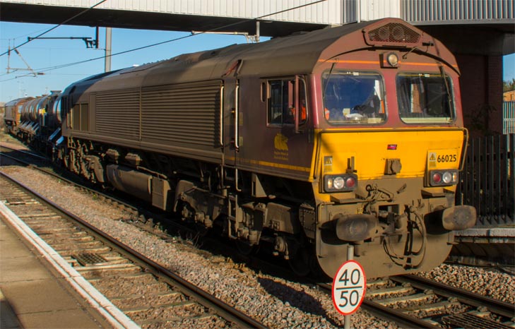 DB class 66025 on a leaf full train 