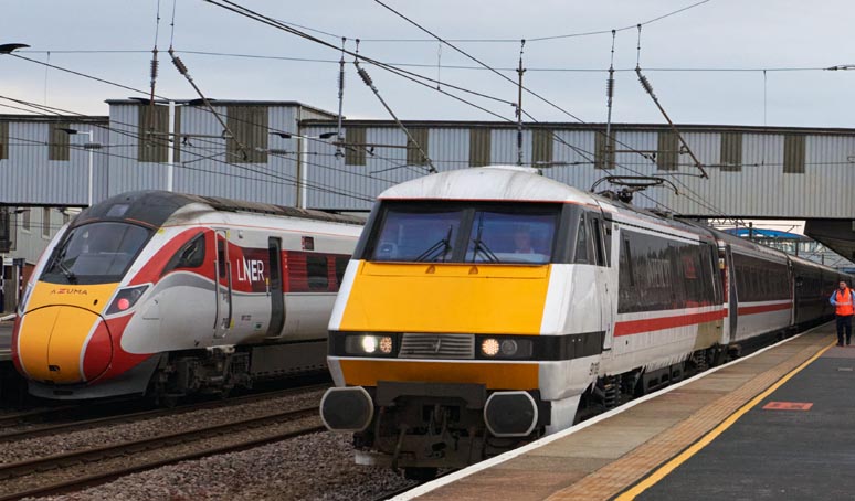 Peterborough station with LNER Azuma and LNER class 91119