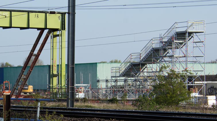 footbridge with the temporarily steps built but the is still a large gap