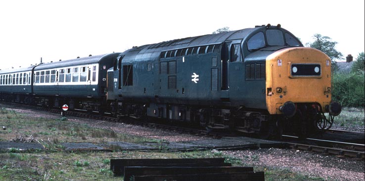 Class 37091 in the sidings at Spalding station with its train in 1979