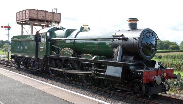 GWR 4-6-0 Raveningham Hall At Bishops Lydread station 