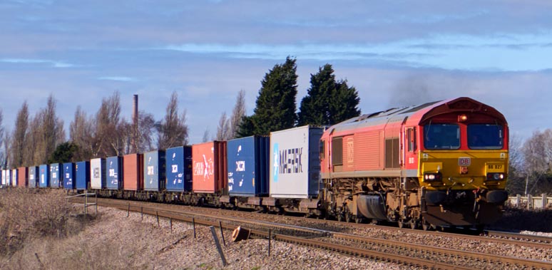 DB class 66027 at Whitlesea on the 20th of February  in 2023 