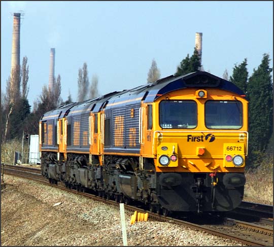 Three GBRf class 66s with 66712 at the rear heading for Peterborough