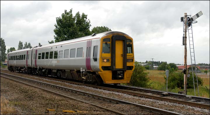 158863 in Alphaline livery in July 2008 just to west of Whittlesea station.