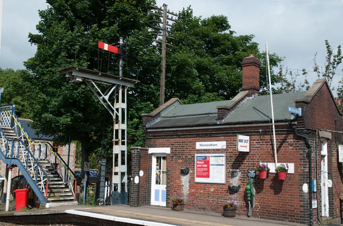 Wymondham a signal and a building 