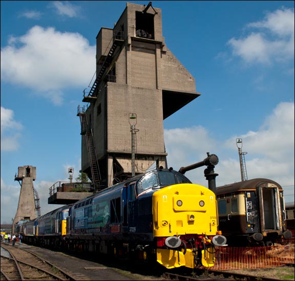 DRS class 37229 Jonty Jarvis with the Carnforth coaling tower behind at the 2008 open day  DRS class 37229 Jonty Jarvis with the Carnforth coaling tower behind at the 2008 open day