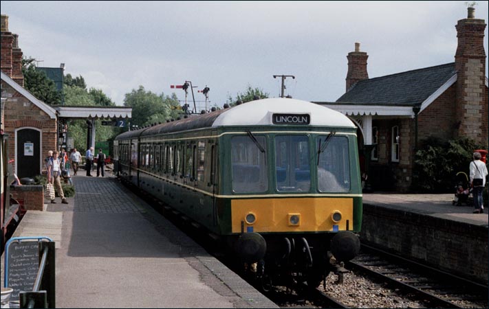 Castle Hedingham station with a DMU in the station 