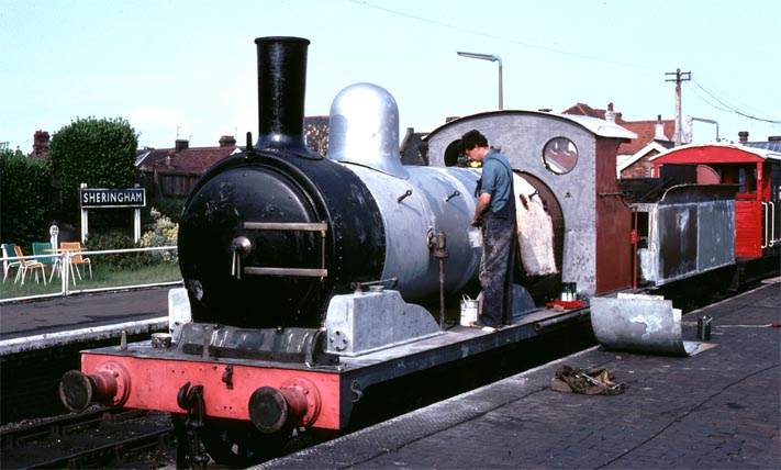 The J15 in Sheringham station in station in the  1970s being worked on in the open.