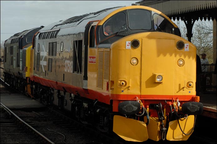 Class 37518 with a fresh coat of paint and class 37667 light engines at Wansford station 