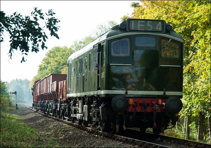 D5185 coming into Orton Mere Station with a freight on the 10/10 2009.    