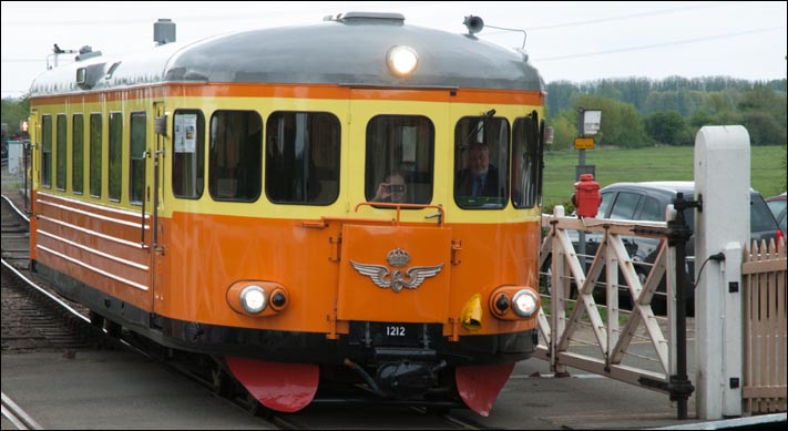 Swedish State Railways Y7 Railcar no.1212 coming over the level crossing at Wansford station in May 2013 Swedish State Railways Y7 Railcar no.1212 coming over the level crossing at Wansford station in May 2013